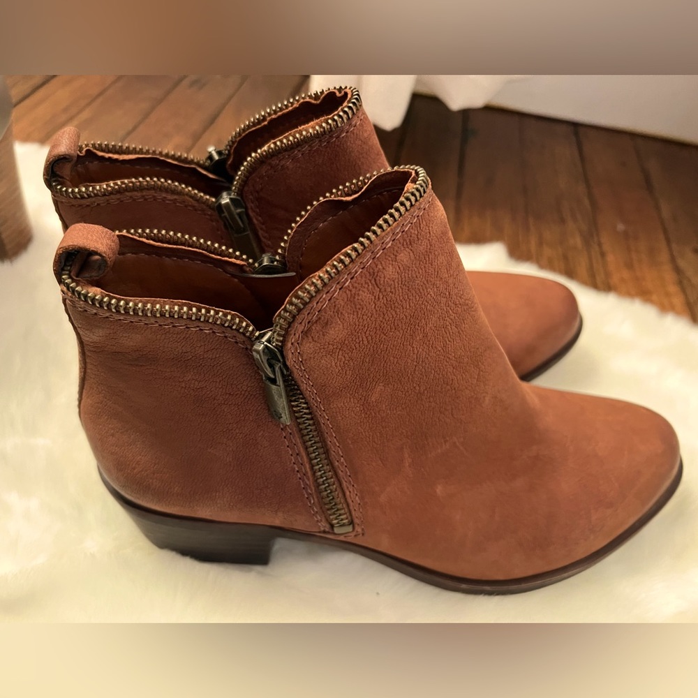 Lucky brand cognac booties with side zippers. Size 8. NWOT.